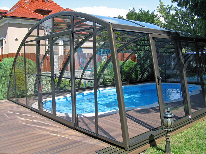 A High Profile Pool Enclosure Covering a Swimming Pool